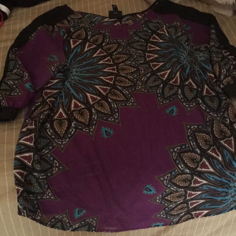 Dressy purple top with paisley type of pattern